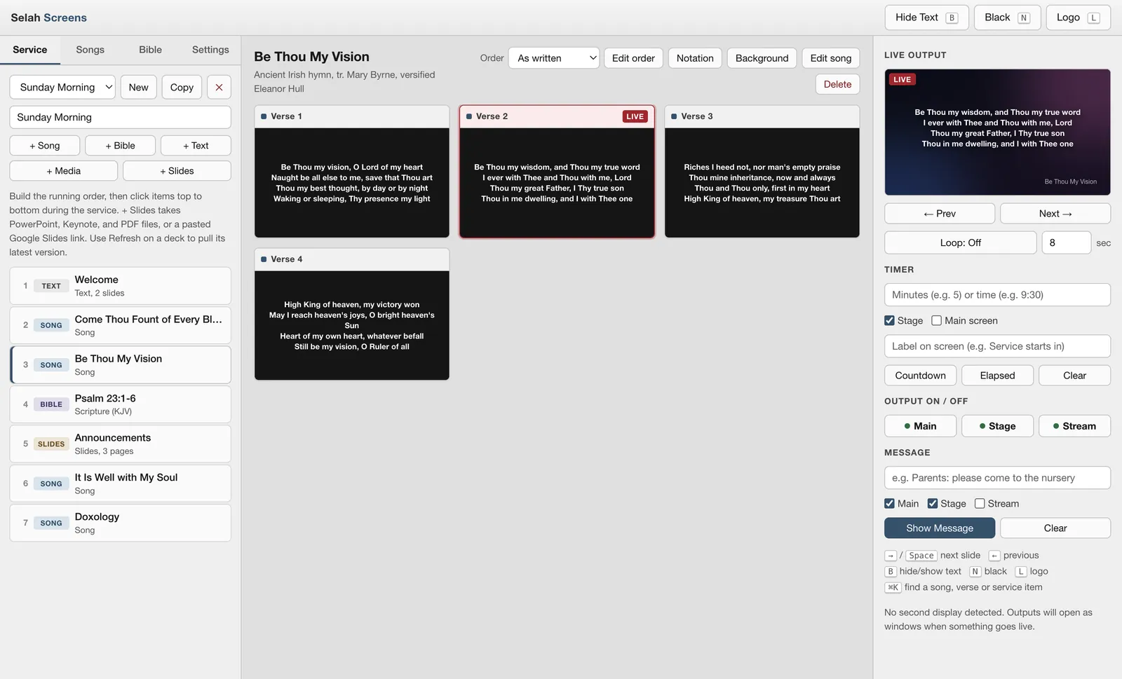 Selah Screens operator window: a seven-item Sunday running order on the left, the verses of Be Thou My Vision in the middle with Verse 2 marked live, and the live preview, timer, output switches and message box on the right.